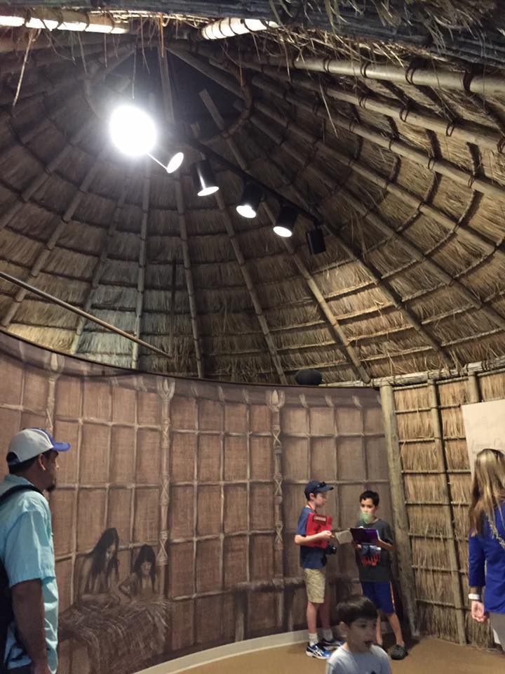 The exhibits are truly exceptional! Inside of a straw hut.